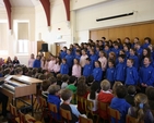 Pupils of a South Dublin School singing at the re-dedication of their school buildings following extensive refurbishment.