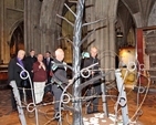 Archbishop Justin Welby examines the Tree of Remembrance in the Lives Remembered Exhibition at St Patrick’s Cathedral during the Dublin leg of his visit to the Church of Ireland. Also pictured is Dean Victor Stacey. 