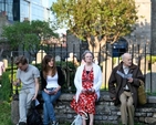 Parishioners  of St Michan’s enjoy a balmy May evening as they await the start of the service to dedicate the new Smithfield entrance to the churchyard. 