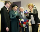 The President and his wife Sabina were presented with products made by the Sheep Thrills knitting group which meets weekly in the centre. They are pictured with the Rector of Holy Trinity, the Revd Niall Sloane and Sheep Thrills coordinator, Joan Millar, at the official opening of the refurbished centre. 