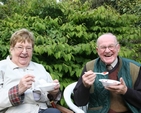 Pictured enjoying their Strawberries and cream at a strawberry and wine reception in Sandford Parish are Jean Darling and Joe Darling.