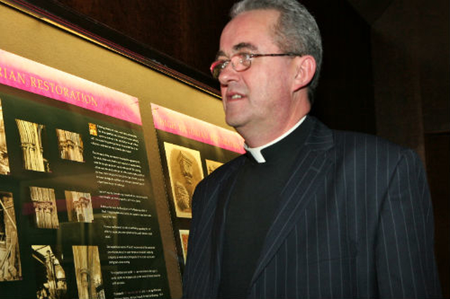 The Dean of Christ Church Cathedral, the Very Revd Dermot Dunne, views the ‘Christ Church Restored’ exhibition at its launch in the Irish Architectural Archive on Merrion Square.