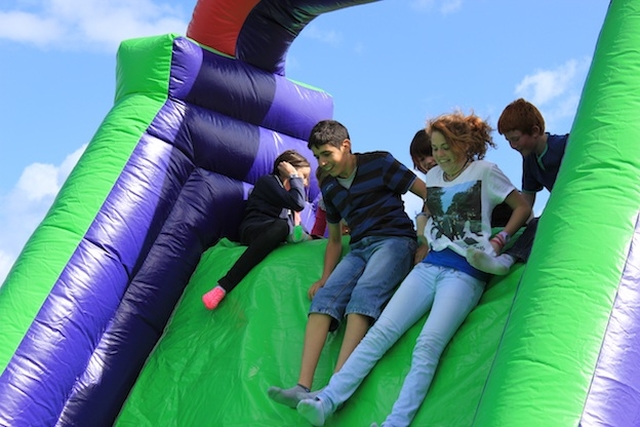 Young people enjoying the bouncy castle at the East Glendalough Parishes Funday. Photo: The Revd Nigel Waugh.