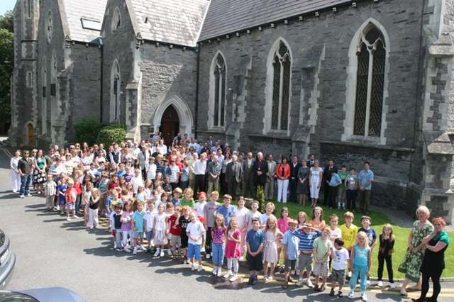 Pictured are pupils, teachers and guests at the planting of a yew tree in a South Dublin school to celebrate community spirit and unity in Europe. The Ambassadors of several European states were present for the ceremony.