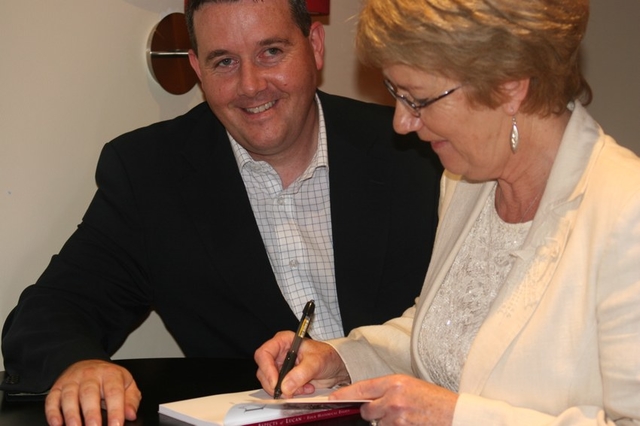 Pictured getting his copy of aspects of Lucan signed by one of the contributors (Linda Curran) is Paul Gogerty TD.