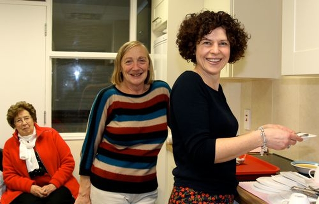 Janet Fox, Ruby Morrow and Ruth Laycock helping to feed the armies of choirs who sing during the Black Santa Sit Out at St Ann’s, Dawson Street. 