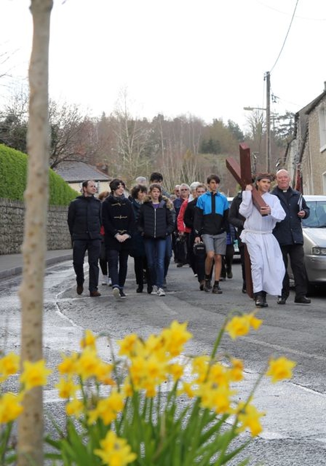 The Ecumenical Way of the Cross proceeds into Enniskerry Village en route from St Mary’s Church to St Patrick’s Church, Powerscourt. 