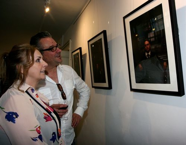 Singer Moya Brennan and Tim Jarvis admire the photographic portraits in the first exhibition to take place in the new St Michan’s community art gallery. 