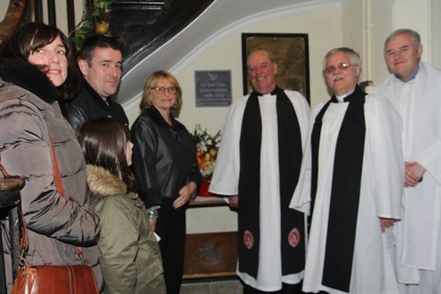 Jenny McCrohan, Christopher Heaney, Anna Rose, Marie Heaney, Archdeacon Ricky Rountree, the Revd Ken Rue and Fr Eamonn Crosson at the dedication of a plaque in memory of Seamus Heaney in Nun’s Cross Church, Killiskey. 