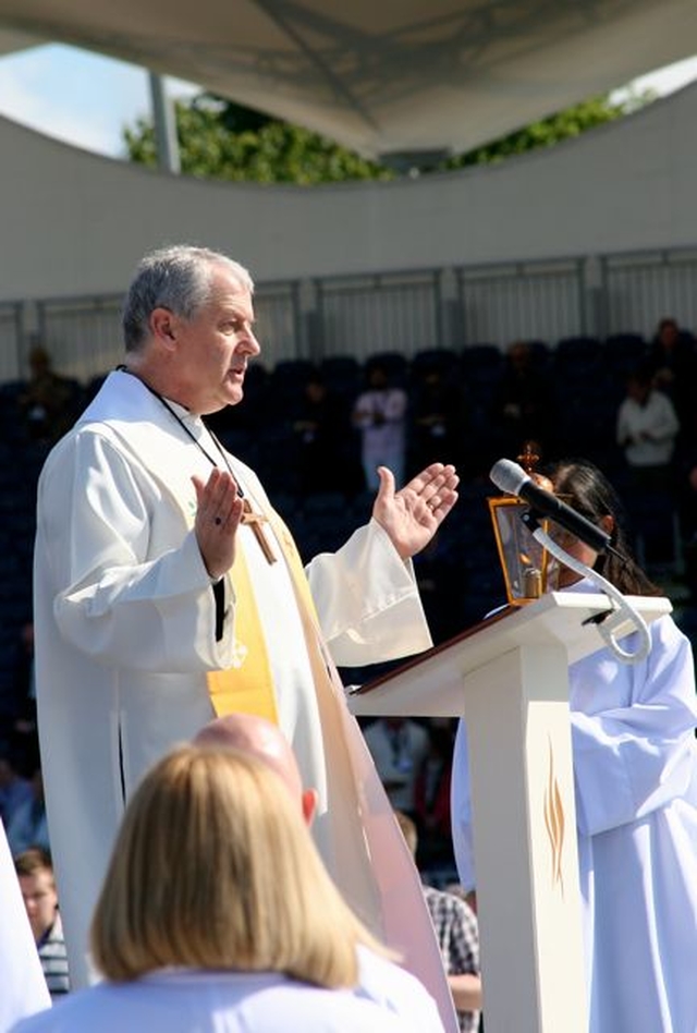 Archbishop Michael Jackson blesses the water in the Liturgy of the Word and  Water on the first full day of the International Eucharistic Congress in the RDS.