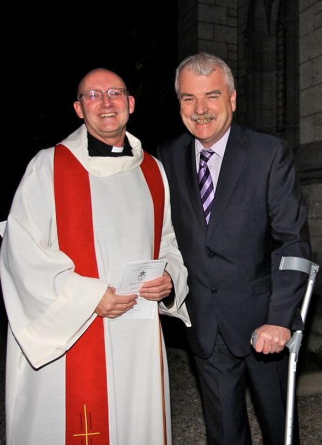 The new rector of Raheny and Coolock, the Revd Norman McCausland, is greeted by local TD, Deputy Finian McGrath, following his service of institution in All Saints’ Church, Raheny, on Friday November 29. 