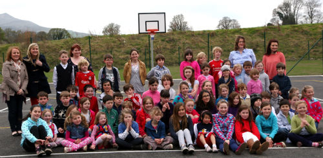 Pupils of Powerscourt NS on the basketball court at their new state of the art passive school. 