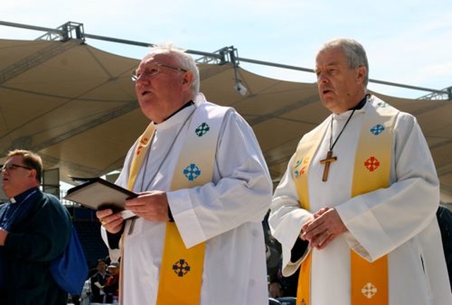 Archbishop Michael Jackson processes to the alter for the Liturgy of the Word and Water with Bishop Brian Farrell. 