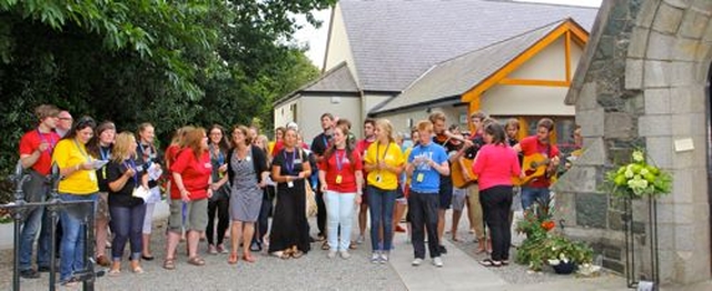 Leaders of CSSM sing outside St Patrick’s Church, Greystones, before the service of thanksgiving and praise marking the church’s 150th anniversary. 