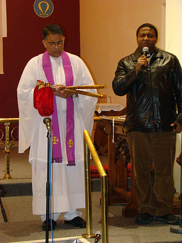 The Revd Dr Jacob Thomas and the Revd Obinna Ulogwara praying at Christmas Carol service of the Church of South India (Malayalam) recently at St Catherine’s Church, Donore Avenue.