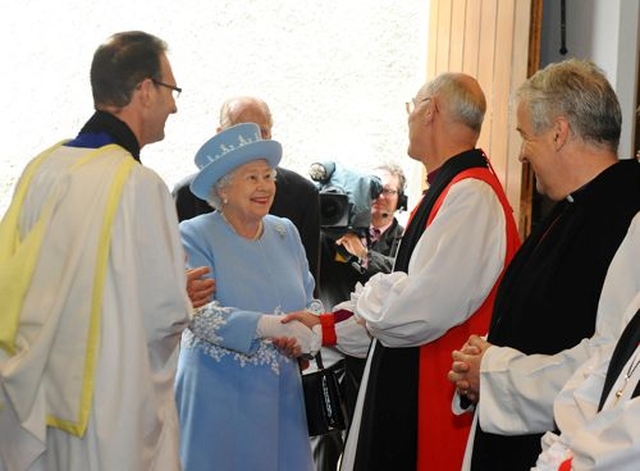 Queen Elizabeth II is meets the Archbishop of Armagh and Primate of All Ireland, the Most Revd Alan Harper, OBE and the Archbishop of Dublin, the Most Revd Dr Michael Jackson, at the entrance to St Macartin’s Cathedral, Enniskillen. (Photo: Harrison Photography)