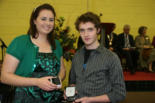 Síofra Bennett and Evan O'Brien, joint winners of the Wilson and Suffern Form Prize for First place in the Leaving Certificate with their medals at Kings Hospital Charter Day.