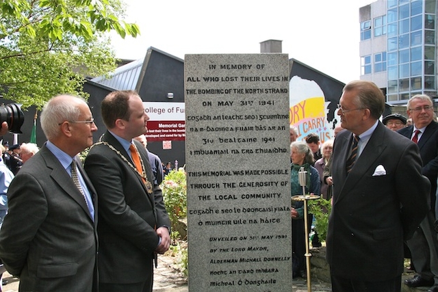 Jim Martin, Principal of Marino College of Further Education; Cllr Ray McAdam, representing the Lord Mayor of Dublin; and German Ambassador Busso Von Alvensleben viewing the North Strand Bombing commemorative plaque in the Memorial Garden at Marino College of Further Education. 