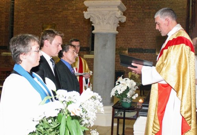 Archdeacon David Pierpoint enrolling Dr Ann Lodge, Rory Traynor and Des Reid into the Guild of All Saints’ Church, Grangegorman.