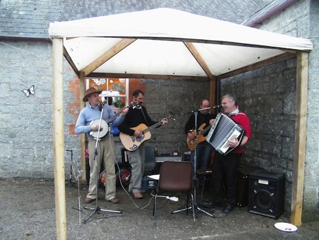 Spencer Hawkins, Jimmy Sunderland, David Hendy & Dermot Finley performing at the Castledermot BBQ and afternoon tea event.