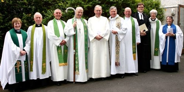 The new rector of Taney, Canon Robert Warren (centre) with Archbishop Michael Jackson, the Very Revd Patrick Towers (preacher), Archdeacon David Peirpoint, Archdeacon Ricky Rountree, the Very Revd Victor Stacey, Revd Stephen Farrell (registrar), Revd Bernie Daly, Revd Adrienne Galligan (rural dean) and Trilly Keating. 