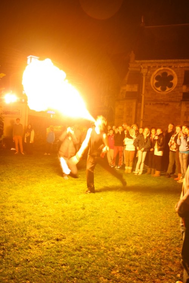 A fire eater performs outside Christ Church Cathedral Dublin before Essential Christmas with a Twist organised by 3Rock Youth.