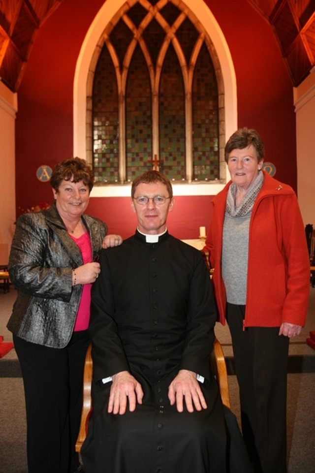 Pictured seated is the newly instituted Vicar of the St Patrick's Cathedral group of parishes, the Revd Canon Mark Gardner with Isobel Gray (left) and Marjorie Bell, parishioners of the Cathedral Group.