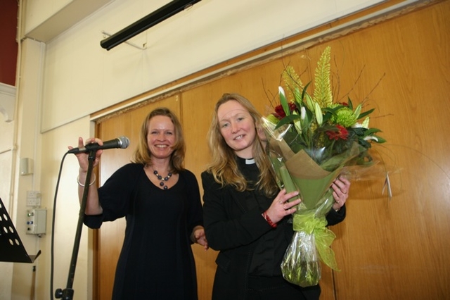 The Revd Sonia Gyles receives flowers at the re-dedication of a south Dublin school. 