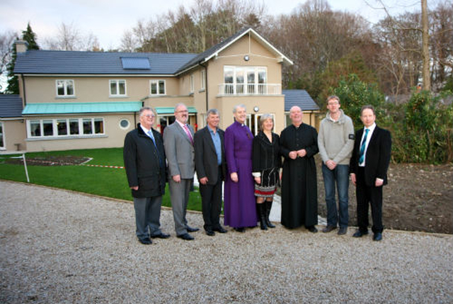 Outside the new rectory at Powerscourt are Richard Bird who oversaw the building project for the parish, John Cullen of Domino Kitchens, Mark Orr of Lambert Developments, Archbishop Michael Jackson, Elizabeth Rountree, Archdeacon Ricky Rountree, Jonathan Leonard who installed the state of the art heating system and architect, Stephen Newell. 