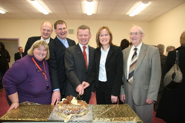 The Minister of State for Food and Horticulture, Trevor Sargent TD cuts the cake to mark the opening of a new school building. Pictured with him (left to right) are Pauline O'Shea, Acting Principal, Robert Cashell, Chairman of the Board of Management, the Revd Alan Rufli, Rector, Elayne Browne, Principal and Leslie Cashell, former pupil.