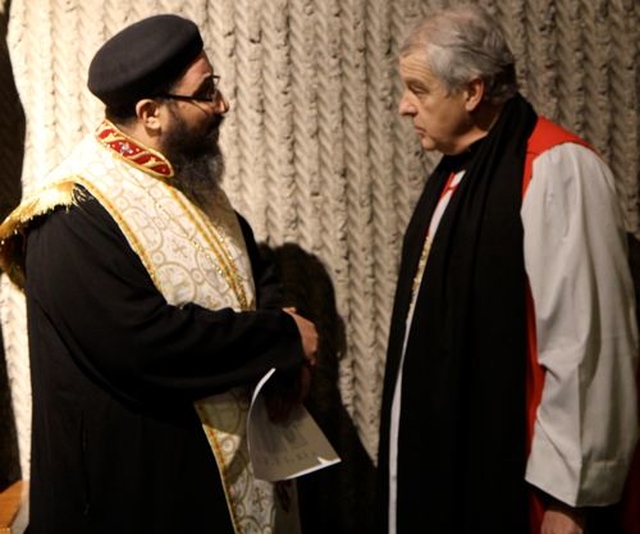 Archbishop Michael Jackson talks to the Revd Fr Athanasius George of the Coptic Orthodox Church before the inaugural service for the Week of Prayer for Christian Unity in St Fintan’s Church, Sutton. 