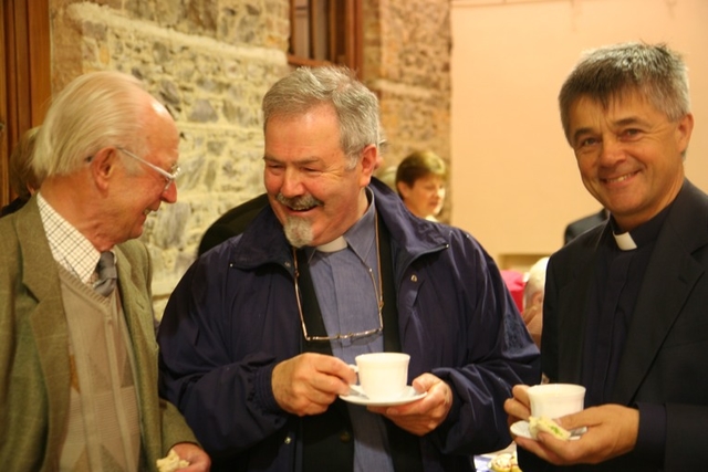 Fr Enda Lloyd, Parish Priest of Greystones (centre) and Fr Liam Belton, Parish Priest of Kilquade (right) enjoying the reception following the Delgany parish Harvest Service.