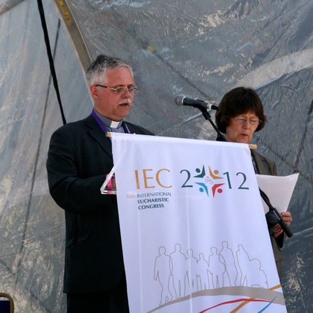 Revd Ken Rue and Gillian Kingston, the Lay Leader of the Methodist Church, address the crowd in the main arena of the RDS prior to the Liturgy of Word and Water on the first full day of the International Eucharistic Congress. 