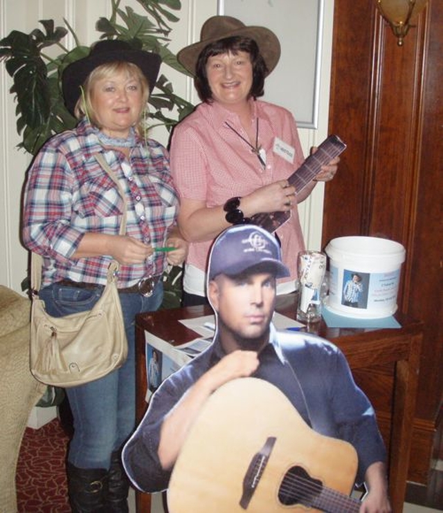 Ruby Deane and Linda Stanley at the Neven Maguire event in Athy raffling Garth Brooks concert tickets.