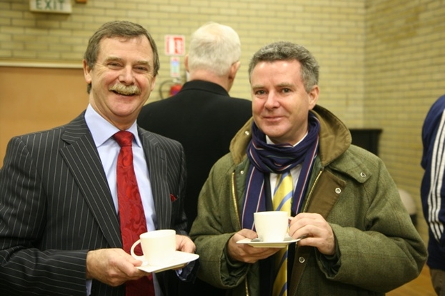 Pictured are Robin George of Protestant Aid (left) and the new Diocesan Secretary, Scott Hayes at the presentation of cheques to various charities from the proceeds of the 2009-2010 Black Santa Collections outside St Ann's Church.