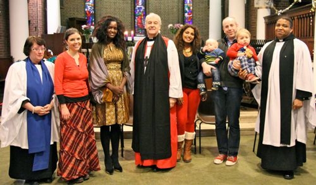 Members of Discovery Gospel Choir Roisín Judge, Justine Nantale, Kate Madoo and Ciaran Judge with Gillian Dean, Archbishop Michael Jackson and the Revd Obinna Ulogwara following the International Carol Service in St George and St Thomas’s. 