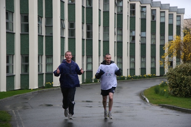 Ordinands from the Church of Ireland Theological Institute, Jason Kernohan and Peter Ferguson finishing their run and cycle for Charity at the Institute.