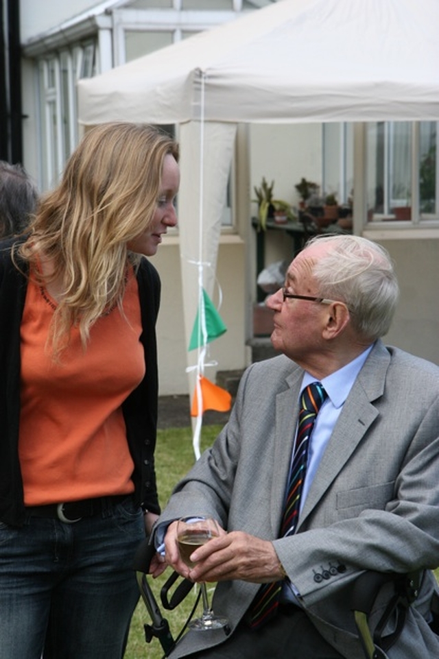 The Rector of Sandford and Milltown, the Revd Sonia Gyles chatting with John Heaslit at the Strawberry and wine reception in the parish.