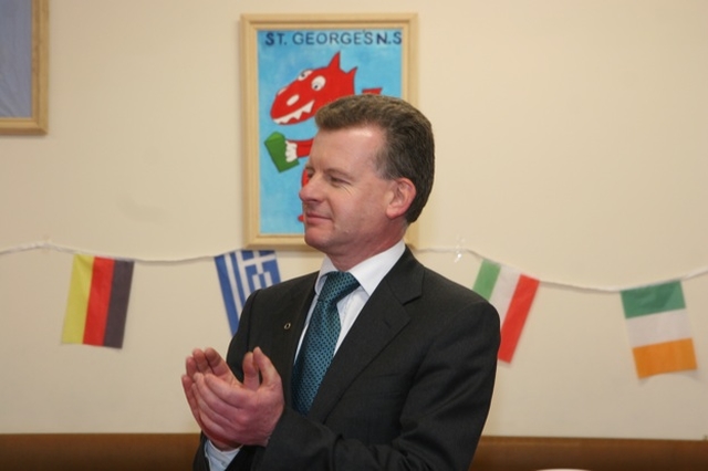 Former Principal of St Georges National School, Minister for Food and Horticulture, Trevor Sargent TD applauds at the reception following a service of thanksgiving marking 150 years of the schools existence.