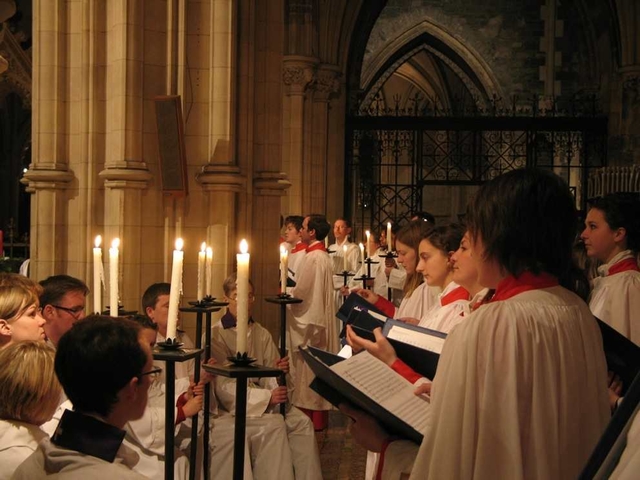 The Christ Church Cathedral Choir accompanied by acolytes singing at the Advent Sunday candlelit service in Christ Church Cathedral.