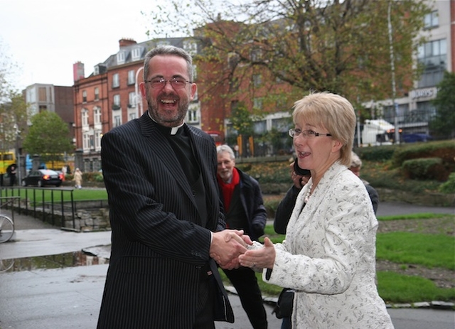 Minister Mary Hanafin shares a joke with Dean Dermot Dunne at the Rediscover Christ Church Book Launch.