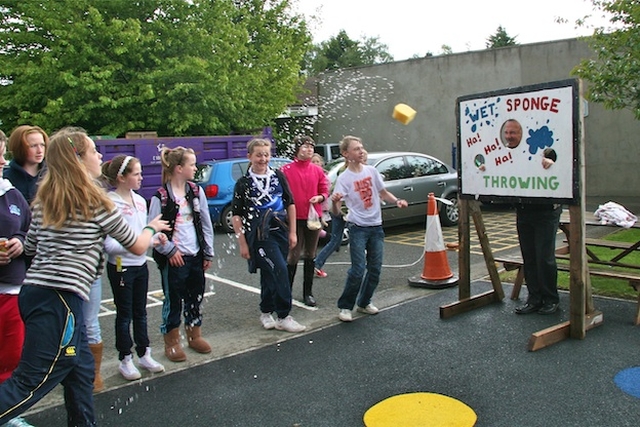 Children enjoying splashing the rector, the Revd Ian Gallagher, at the May Fair at St Brigid’s Church, Stillorgan!