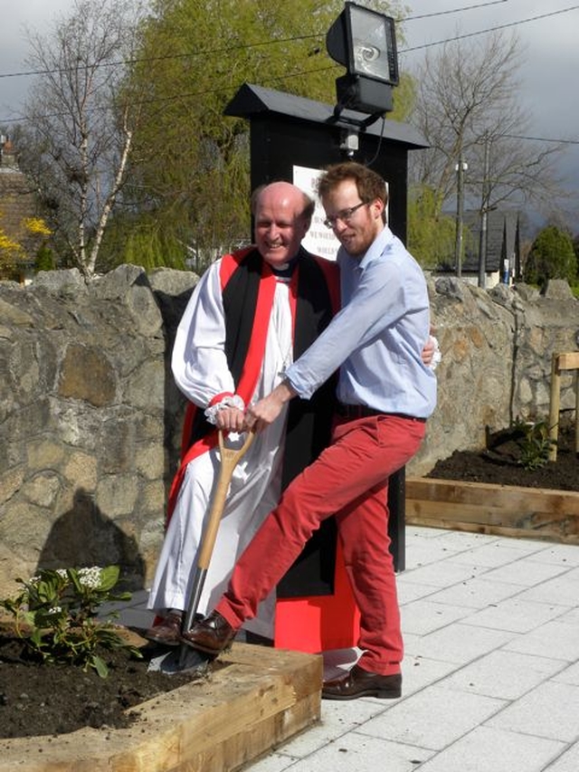 Bishop Ferran Glenfield and his son Richie planting a tree to mark the 150th anniversary of Kill O’ the Grange church. (Photo: James Darling)