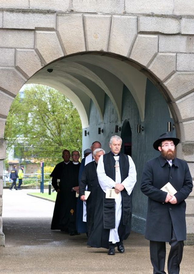 The officiating Representatives of the Faith Traditions enter the quadrangle of Collins Barracks of the National Day of Commemoration Ceremony. Leading the way is Rabbi Zalman Lent, followed by Archbishop Michael Jackson, Fr Tom Carroll of the Greek Orthodox Church, the Revd Kenneth Lindsay president of the Methodist Church in Ireland, the Revd William Buchanan Moderator of the Monaghan Presbytery of the Presbyterian Church in Ireland, Archbishop Diarmuid Martin and Sheikh Yahya Al–Hussein. 