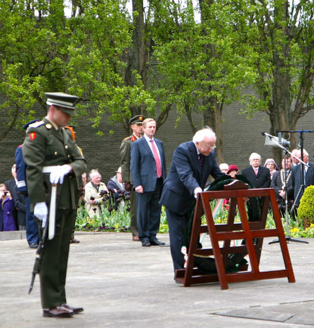 President Michael D Higgins lays a wreath at the graveside of the leaders of the 1916 Rising during the national commemoration service in Arbour Hill. 