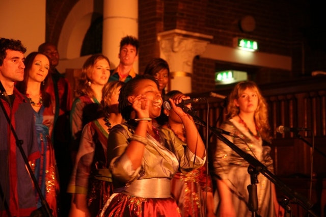 Nono Madolo of the Discovery Gospel Choir leading the singing at their Christmas Concert in St George and St Thomas Church, Cathal Brugha Street, Dublin.