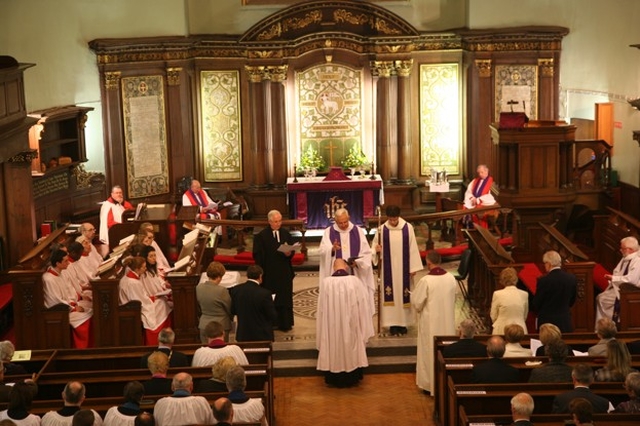 The Archbishop of Dublin, the Most Revd Dr John Neill blesses the Revd David Gillespie during his institution as Vicar of St Ann's with St Mark's and St Stephen's.