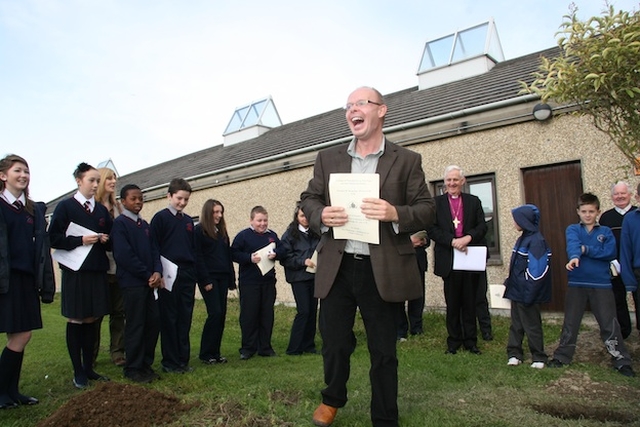 Tree planting at the ecumenical service at Mount Seskin Community College, Tallaght.