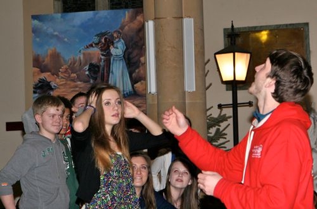 Jonny Somerville tosses a coin for the ‘heads or tails’ game during Essential Narnia in Christ Church Bray. 