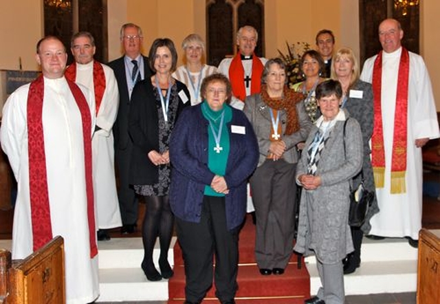 0016 – Newly commissioned Prayer Ministers Audrey Hamilton (Howth), Cynthia Lang and June Gleeson (Celbridge Straffan With Newcastle Lyons), Gillian Keogh and Jean Salter (Killiney–Ballybrack), Lindsey Ryan (Rathdrum), Trilly Keatinge (Taney) and David Caird (Malahide) in St Patrick’s Church, Powerscourt. They are pictured with Archbishop Michael Jackson, the Revd Bruce Hayes, the Revd Terry Lilburn, the Revd William Olhausen and Archdeacon Ricky Rountree. 